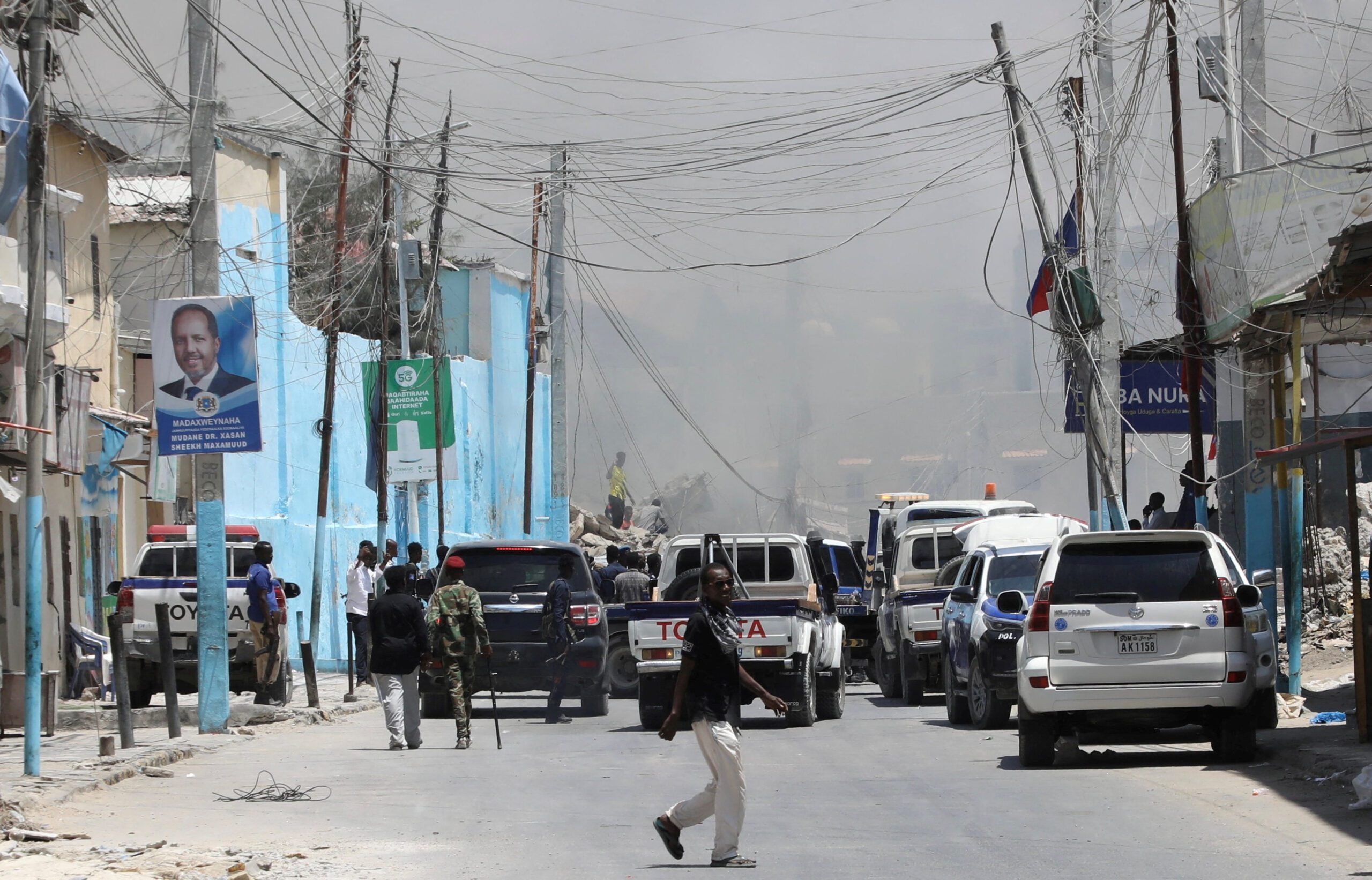 Emergency vehicles gather at the scene of an explosion near the Presidential Palace, also known as Villa Somalia, in the Hamar Jajab district of Mogadishu, Somalia March 18, 2025. REUTERS/Feisal Omar